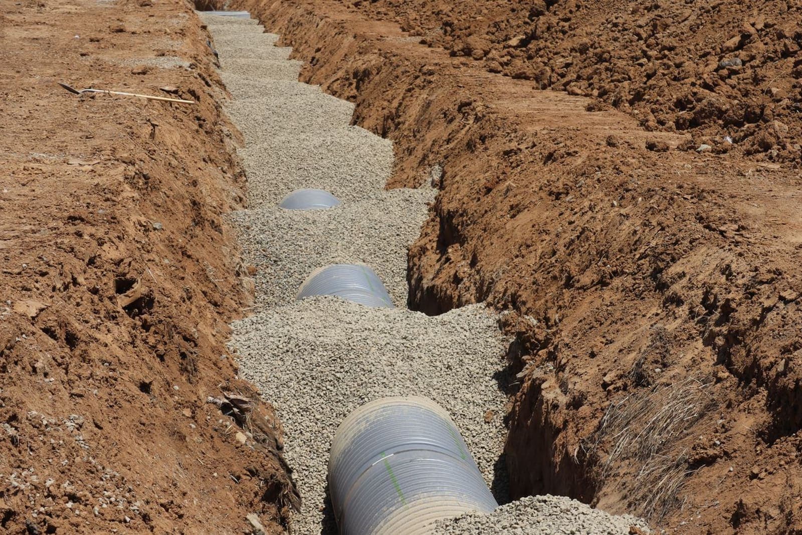 Drain pipe laid in an open trench