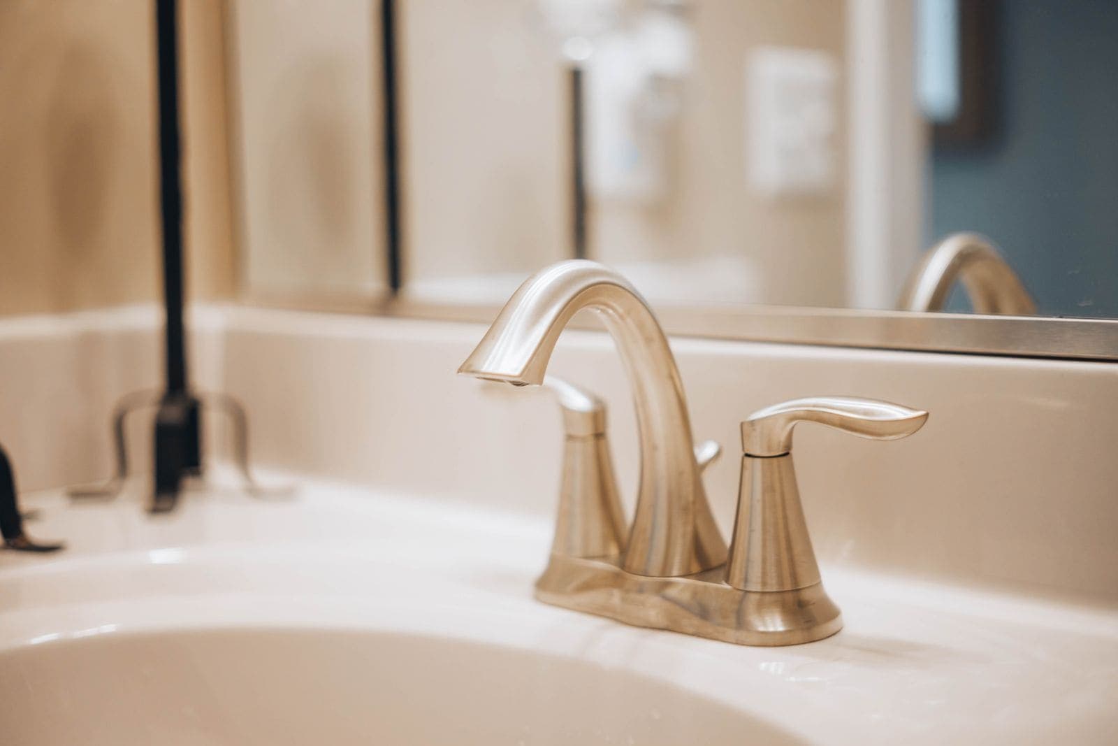 Faucet on a white ceramic bathroom sink