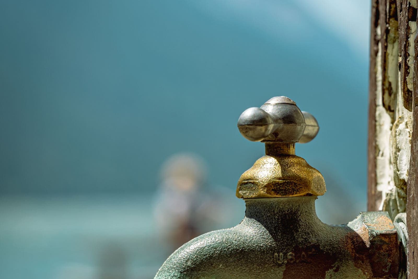 Outdoor faucet mounted on a wooden post